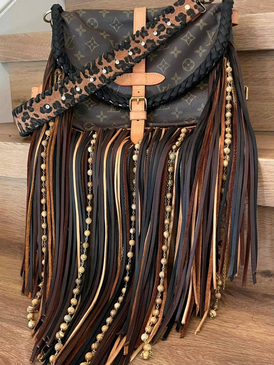 louis vuitton bag with tassels
